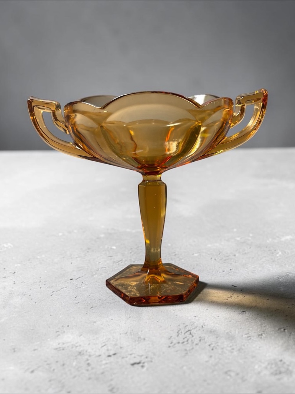 WESTMORELAND AMBER GLASS DOUBLE-HANDLED PEDESTAL COMPOTE BOWL